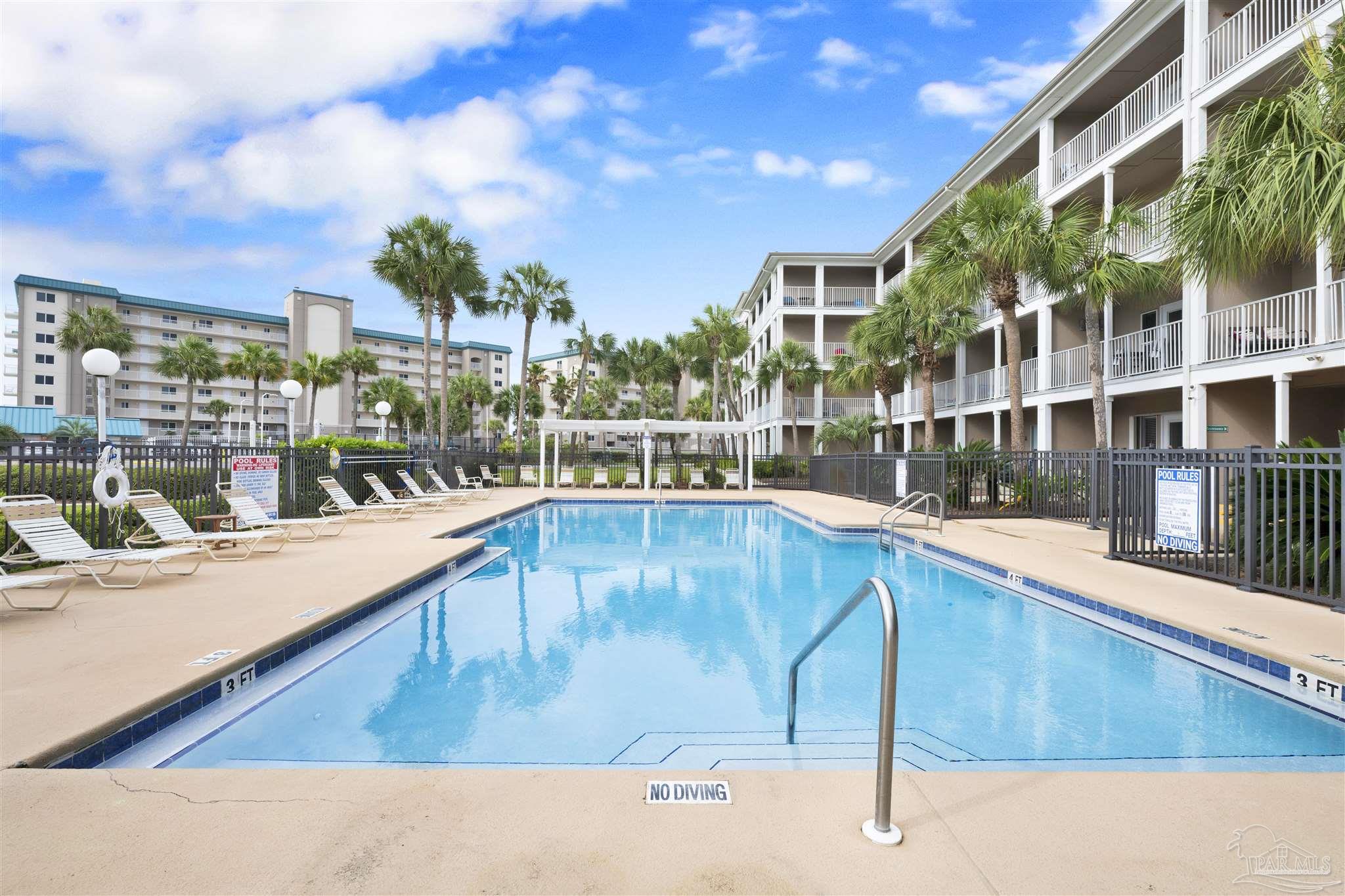 13351 Johnson Beach Road, Unit 203E Perdido Key, FL 32507 - Photo 2 of 55 a view of swimming pool with a patio