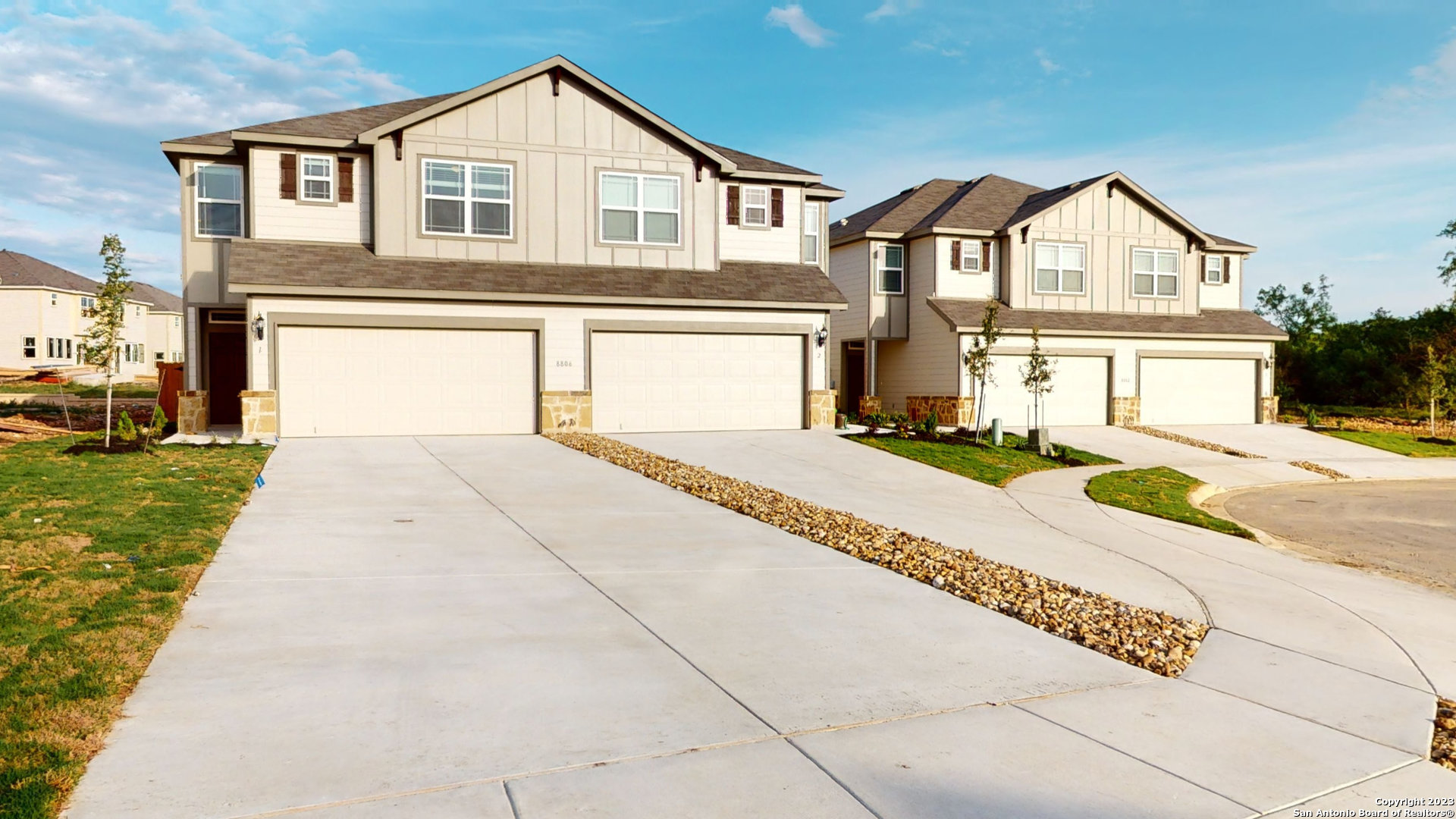 10332 Ida Gdn Way, Unit 2 Converse, TX 78109 - Photo 1 of 1 a front view of a house with a yard