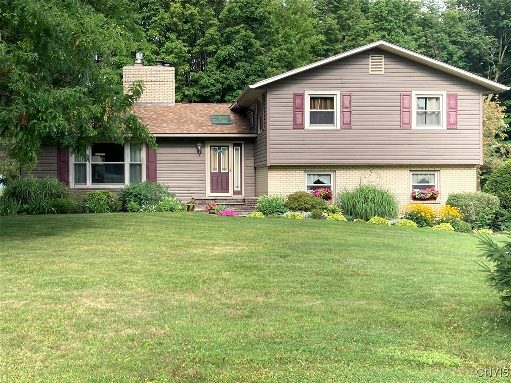 629 Deerfield Drive Oneida, NY 13421 - Photo 5 of 46 The landscaping comes up in the Spring!