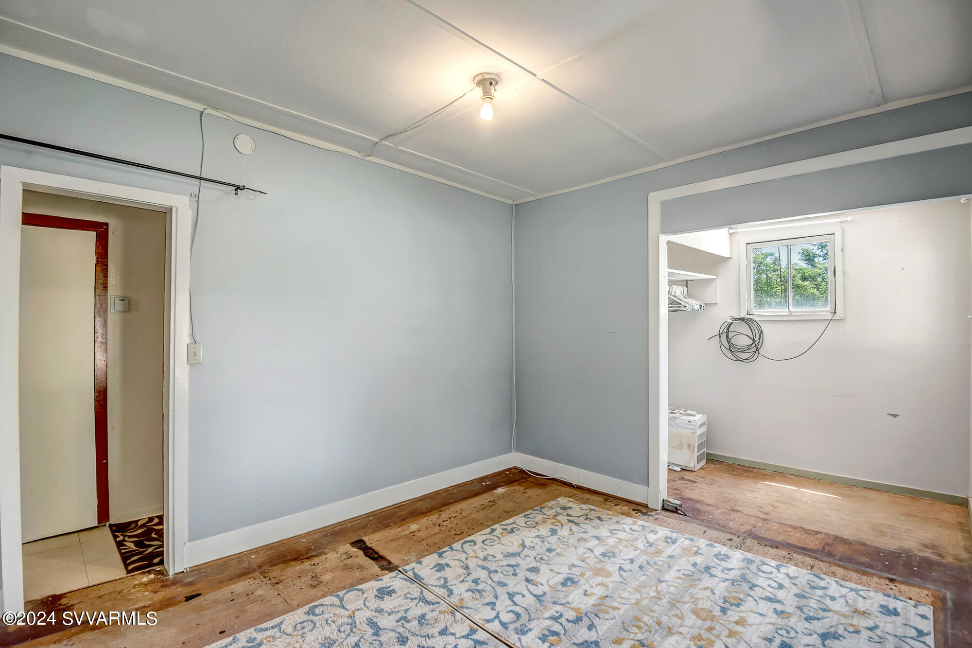 463 East Cocktail Trail Camp Verde, AZ 86322 - Photo 32 of 61 a view of empty room with wooden floor and fan