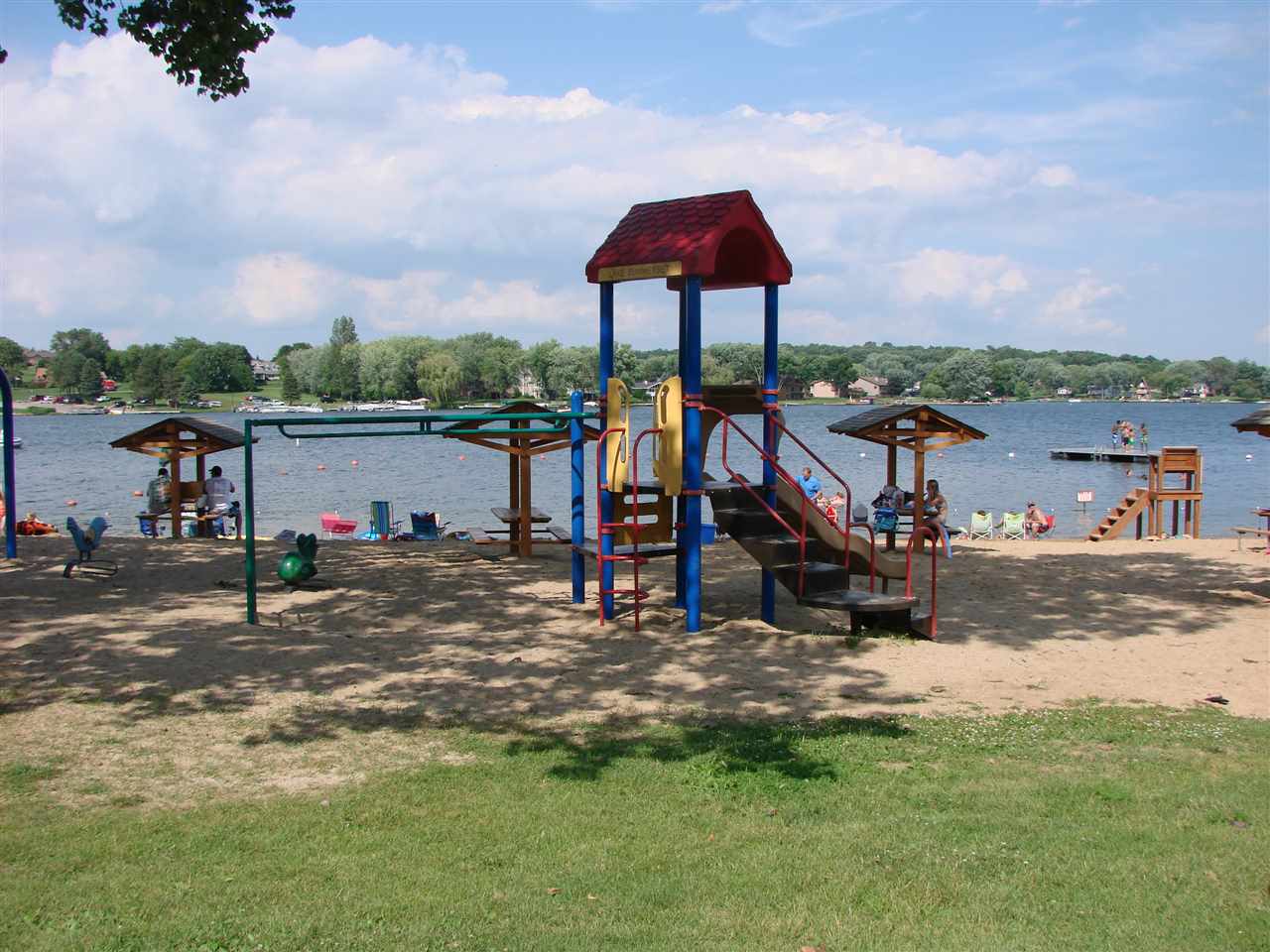 928 Butternut Bend Davis, IL 61019 - Photo 13 of 22 a view of a lake with a table and chairs