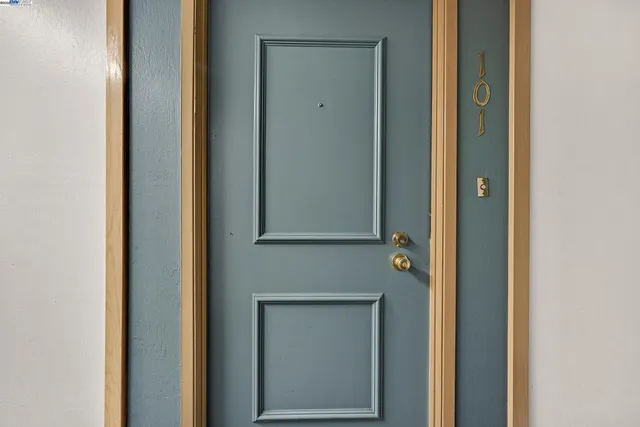 a view of a bathroom from the hallway
