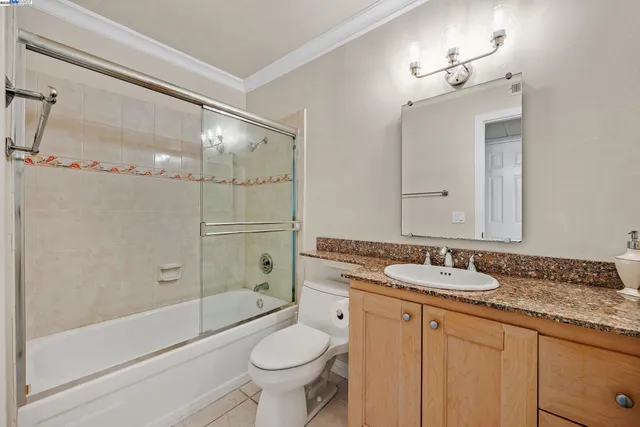 an empty room with a bathroom