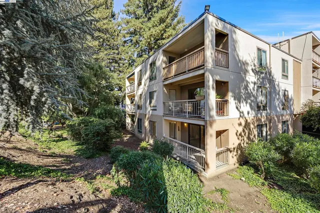 an aerial view of a house with a garden