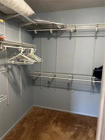 a view of a room with racks on the wall