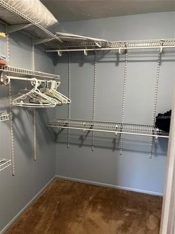 a view of a room with racks on the wall
