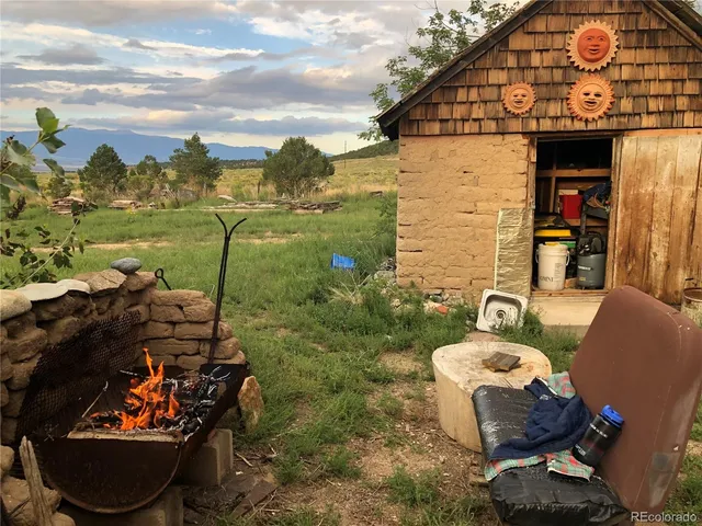 a view of a chairs and tables in the patio