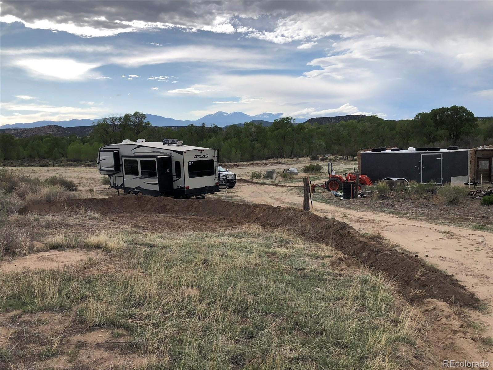 County Road Gardner, CO 81040 - Photo 10 of 16 a view of a house with truck parked on the road