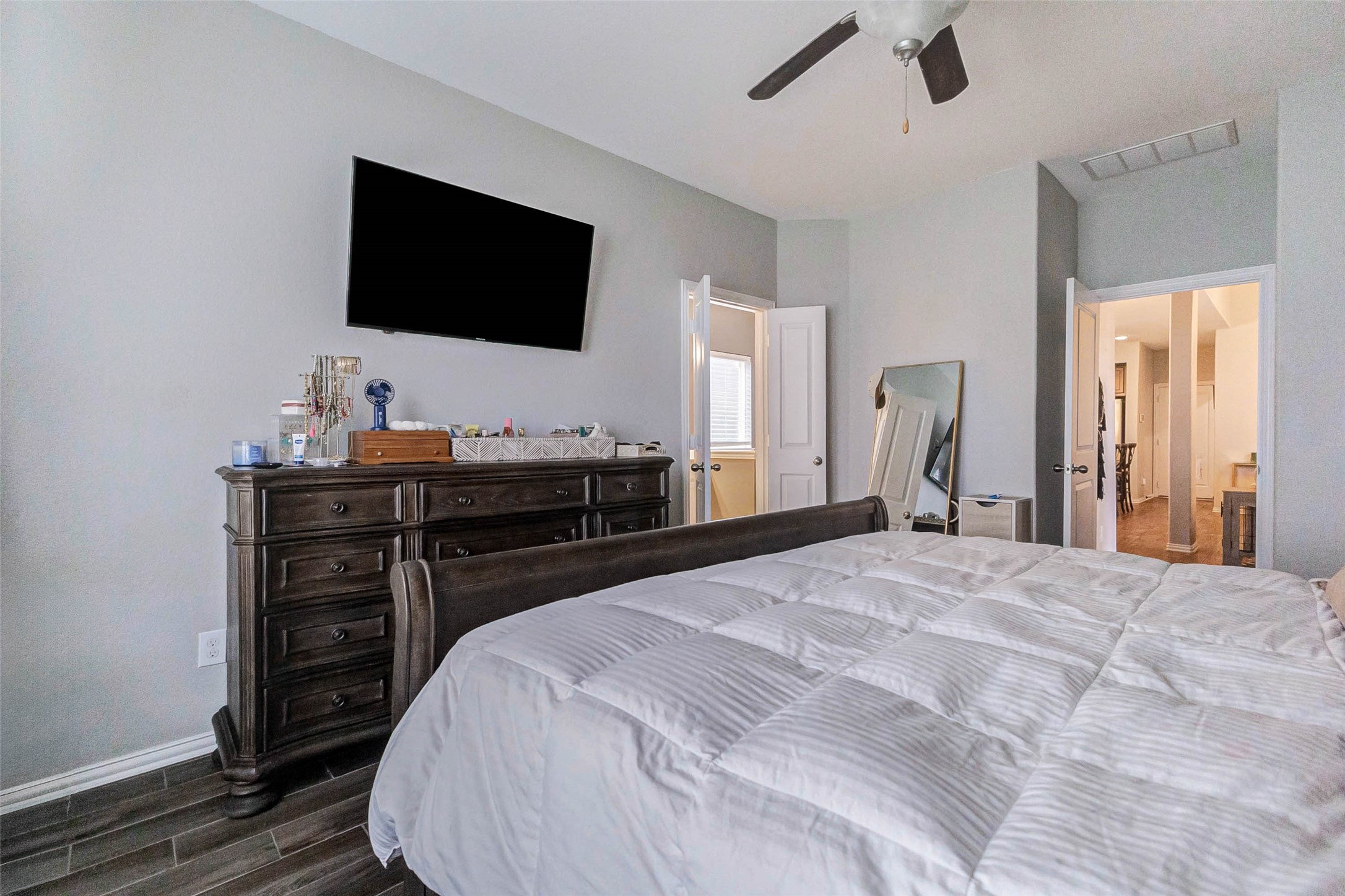 3210 Montclair Orchard Trace Spring, TX 77386 - Photo 28 of 38 a bedroom with a bed and a flat screen tv