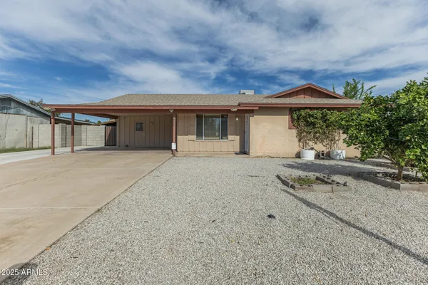 front view of house with a yard