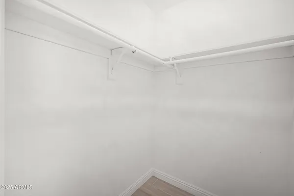 a view of a room with racks on the wall