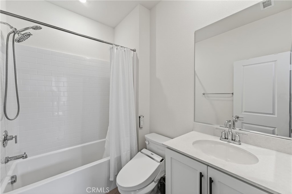 1572 Lima Way, Unit 6 Placentia, CA 92870 - Photo 21 of 35 a bathroom with a sink toilet and shower