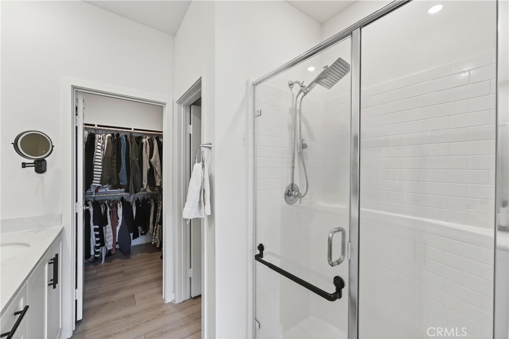 1572 Lima Way, Unit 6 Placentia, CA 92870 - Photo 27 of 35 a view of a walk in closet and bathroom
