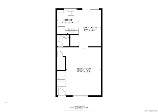 a picture of a bench in front of a wall