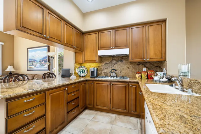 a view of a sitting area with furniture and garden