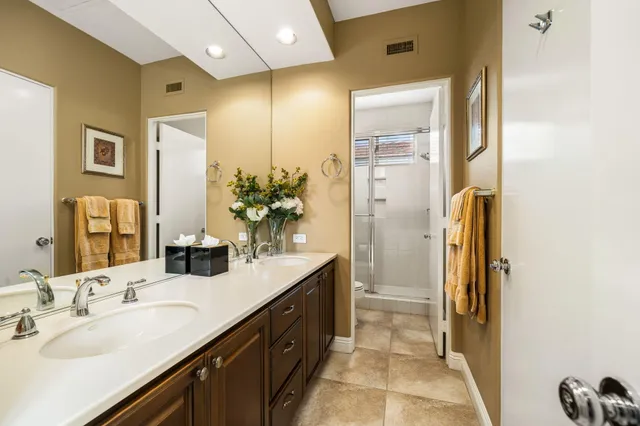 a bed room with a bed and a tv