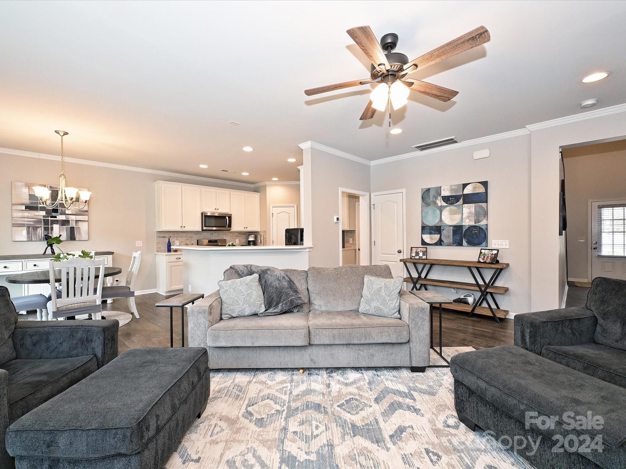 4041 Woodsmill Road Indian Land, SC 29707 - Photo 8 of 36 a living room with furniture and kitchen view