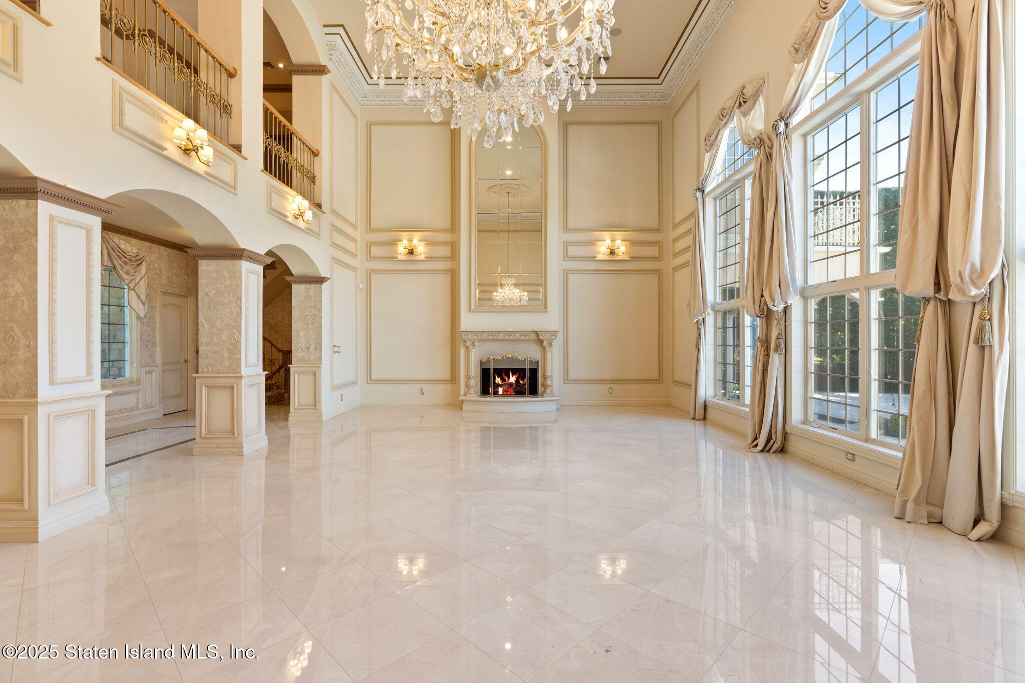 51 Romer Road Staten Island, NY 10304 - Photo 11 of 94 a view of a big room with windows and chandelier