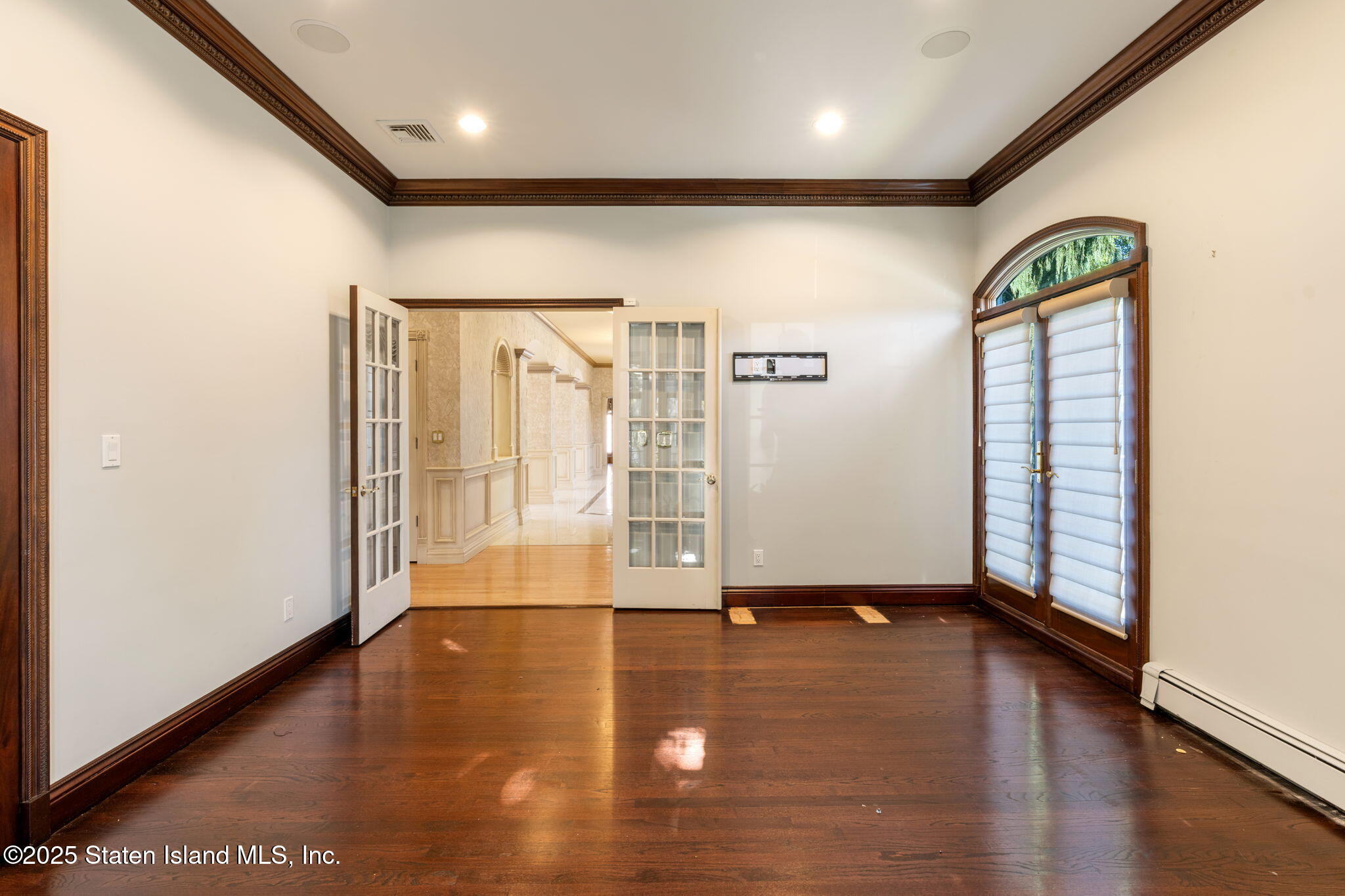 51 Romer Road Staten Island, NY 10304 - Photo 25 of 94 a view of empty room with wooden floor