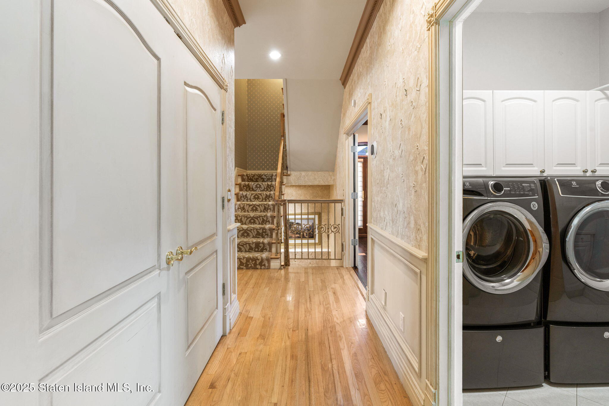 51 Romer Road Staten Island, NY 10304 - Photo 28 of 94 a view of a hallway with washer and dryer