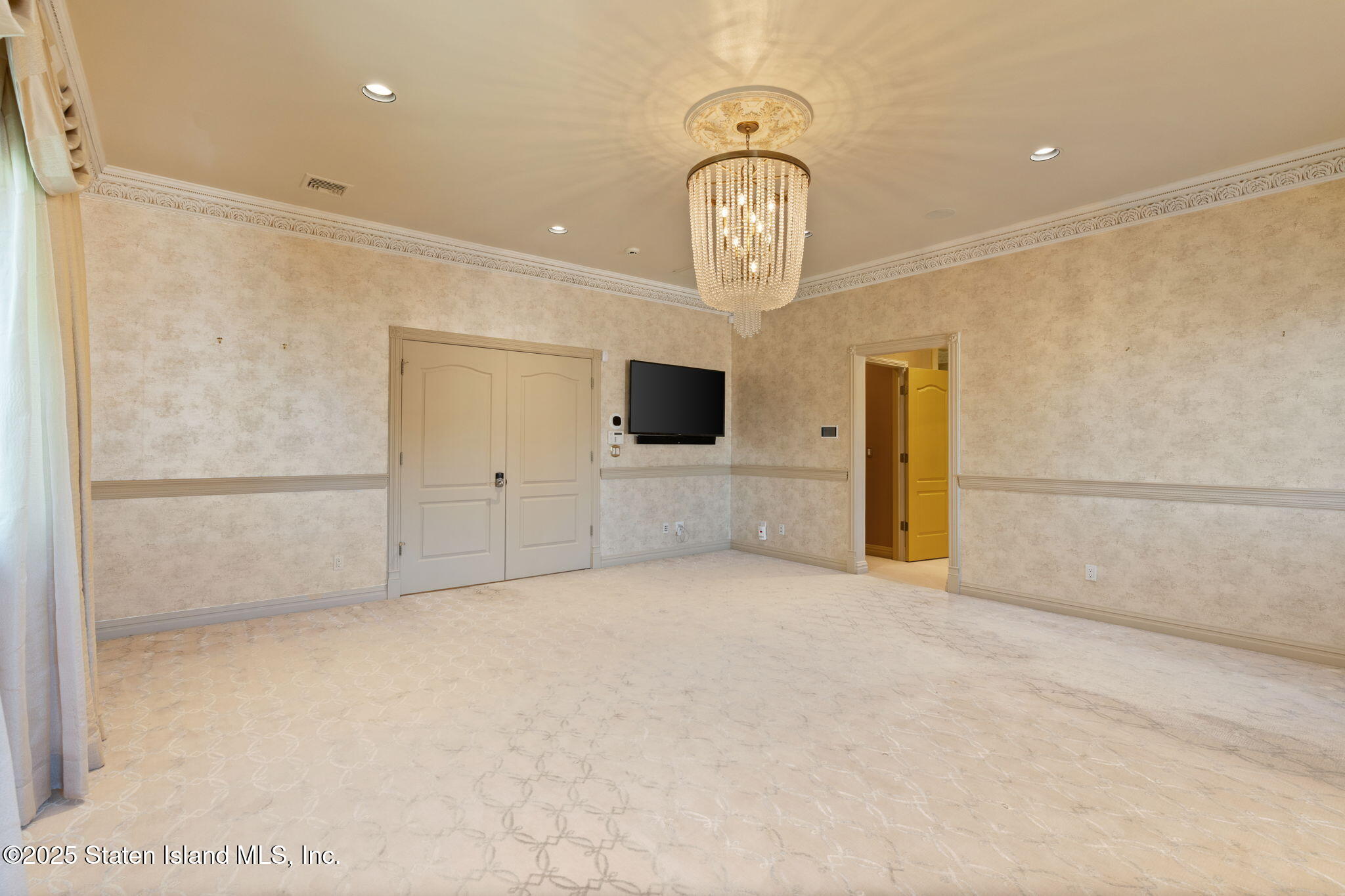 51 Romer Road Staten Island, NY 10304 - Photo 42 of 94 a view of a room with a flat screen tv