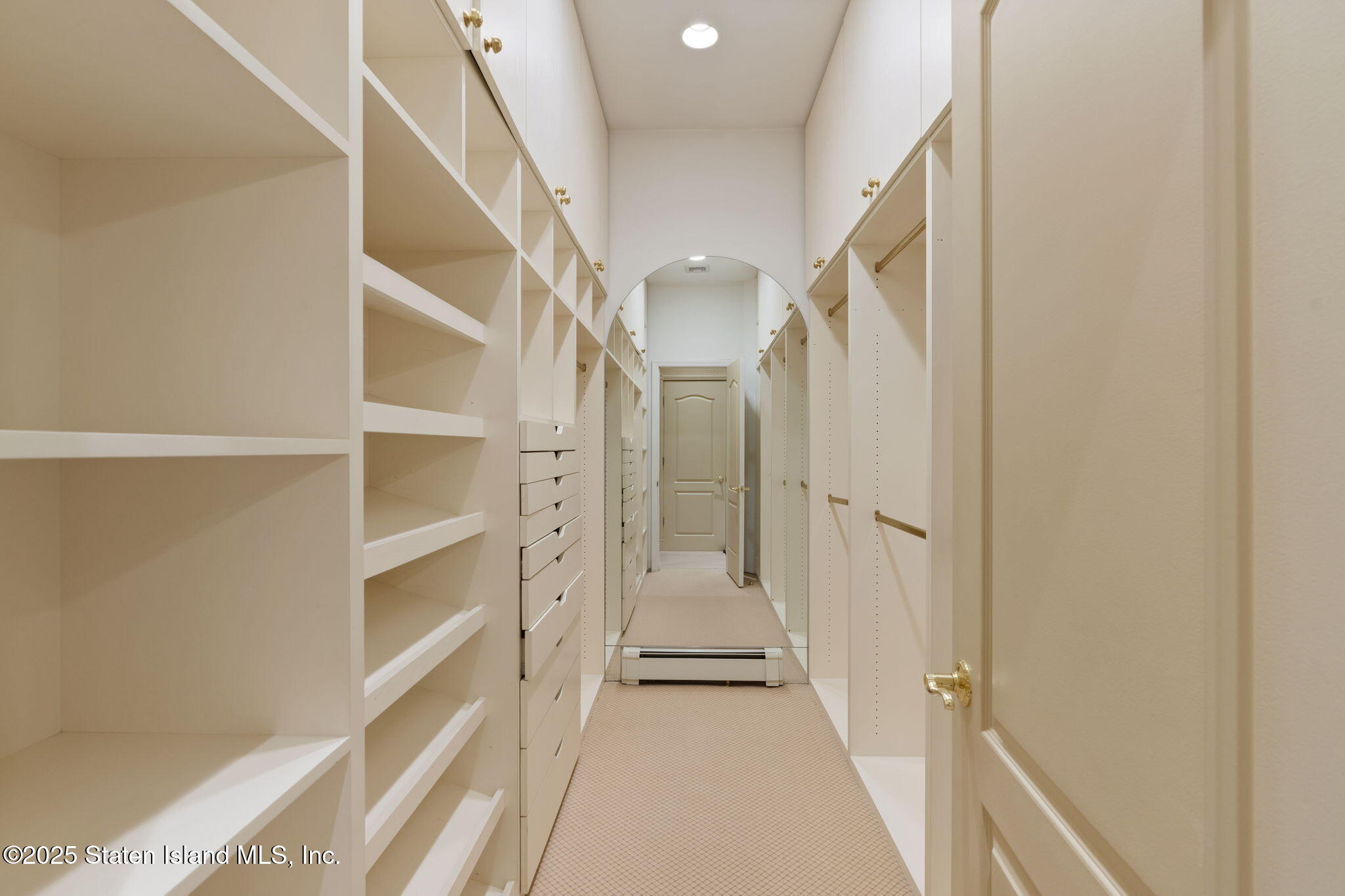 51 Romer Road Staten Island, NY 10304 - Photo 45 of 94 a view of a hallway with wooden floor and entryway