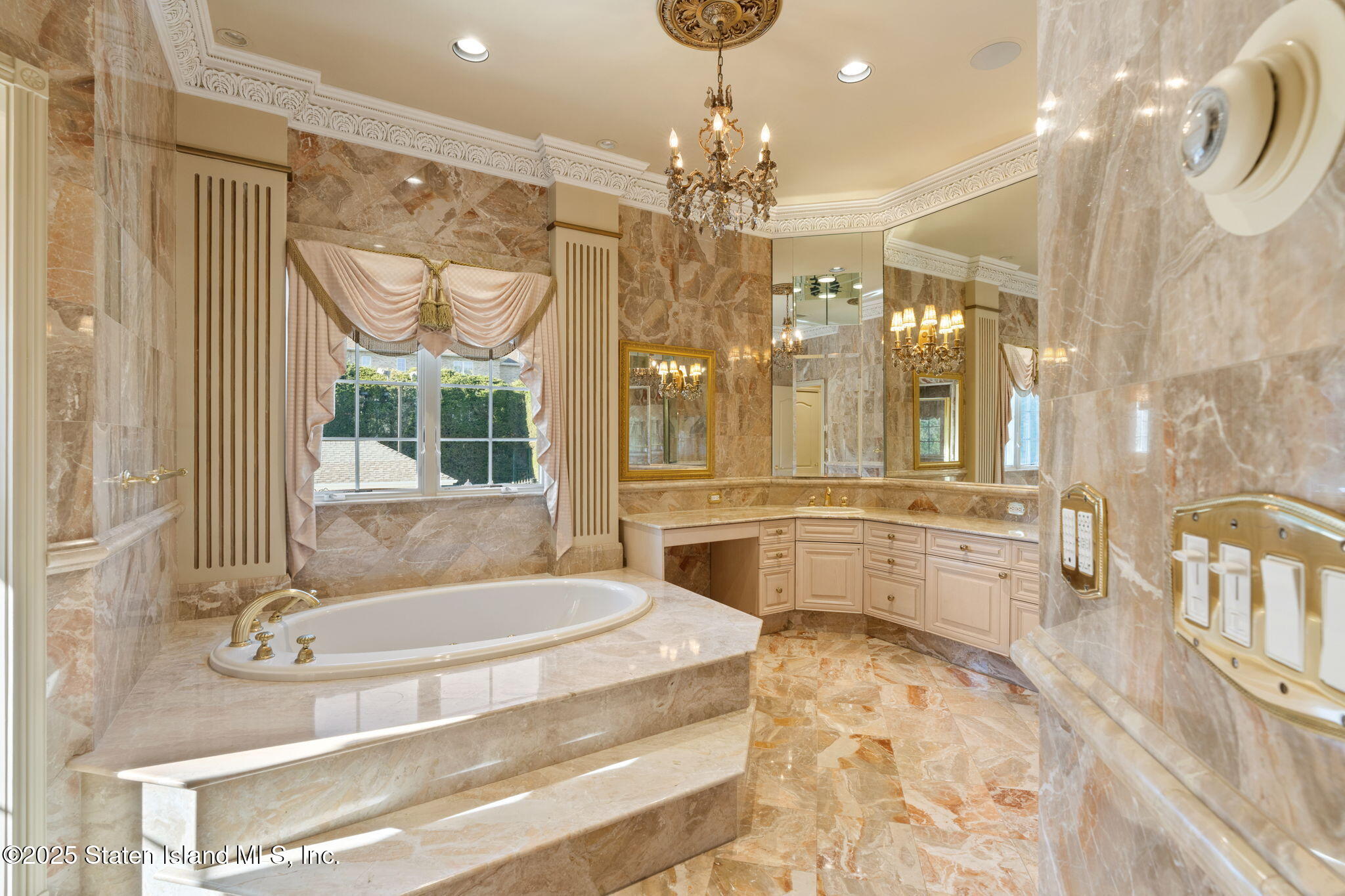 51 Romer Road Staten Island, NY 10304 - Photo 46 of 94 a spacious bathroom with a tub sink and mirror