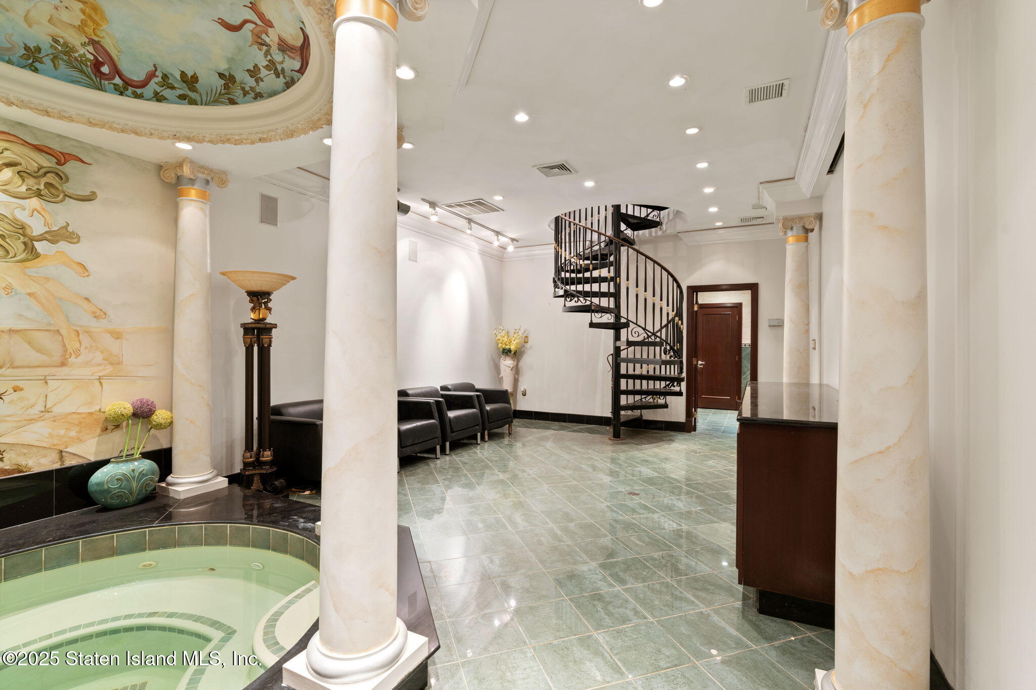 51 Romer Road Staten Island, NY 10304 - Photo 67 of 94 a living room with furniture and a flat screen tv