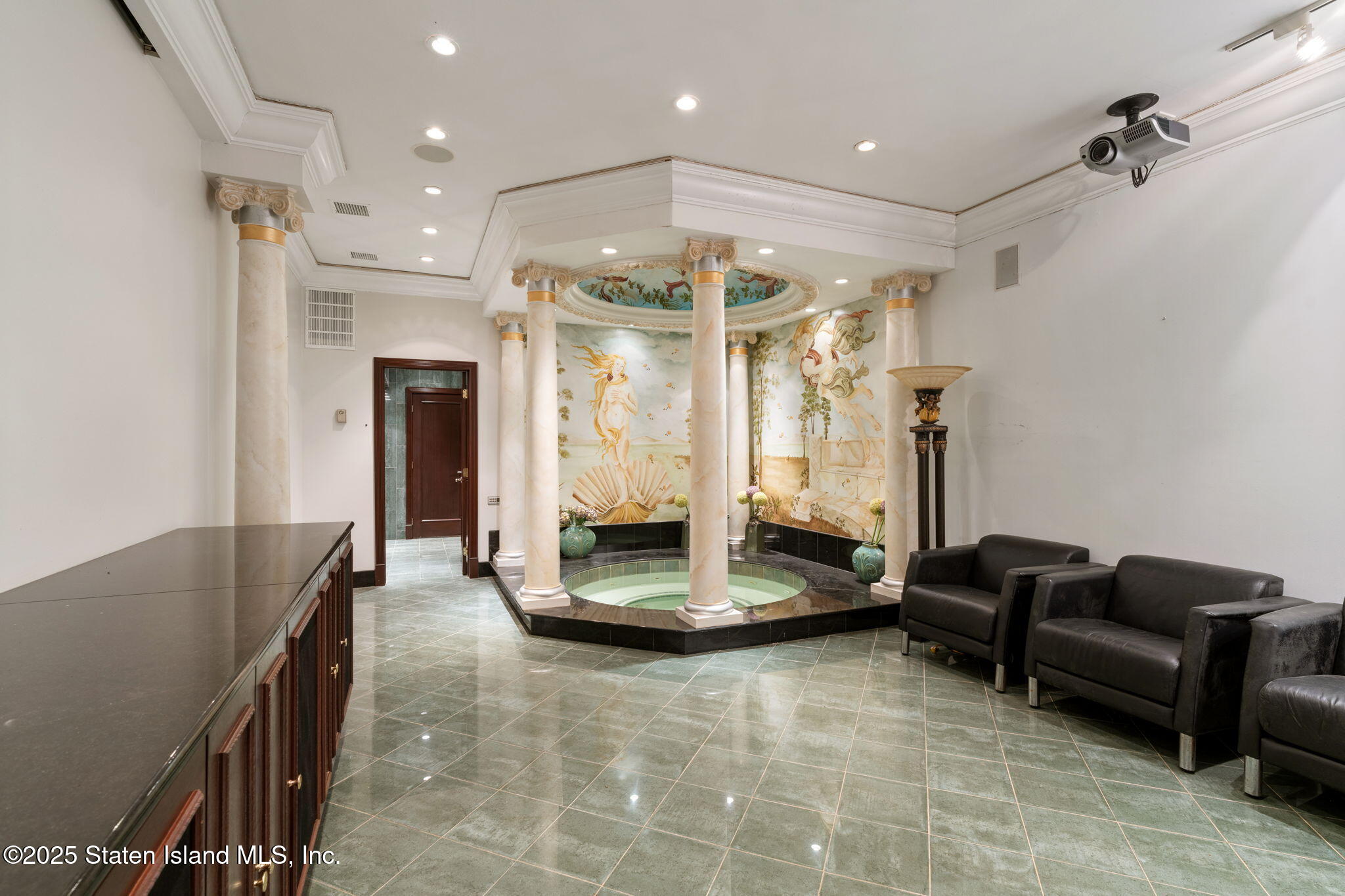 51 Romer Road Staten Island, NY 10304 - Photo 68 of 94 a living room with furniture and a chandelier