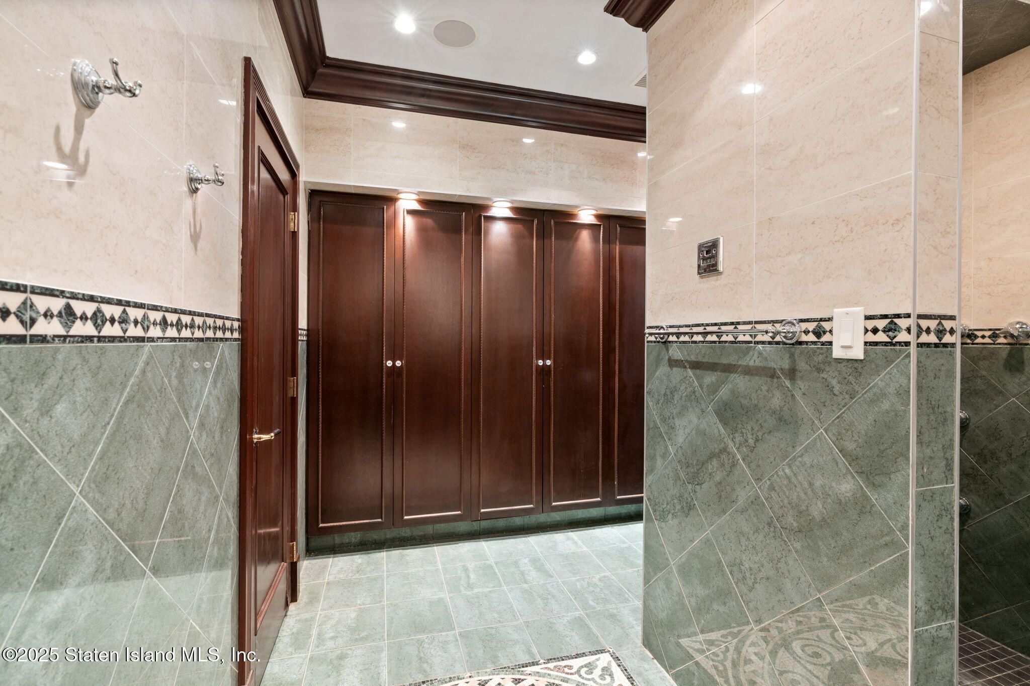 51 Romer Road Staten Island, NY 10304 - Photo 72 of 94 a bathroom with a glass shower door