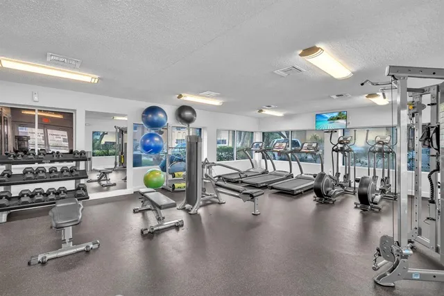 a view of a room with gym equipment