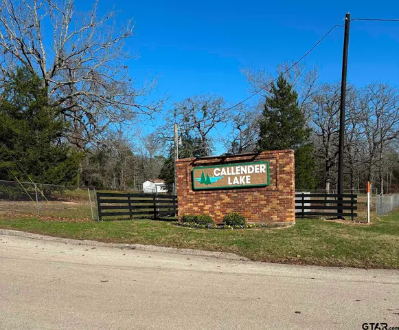 a sign that is on the side of a road
