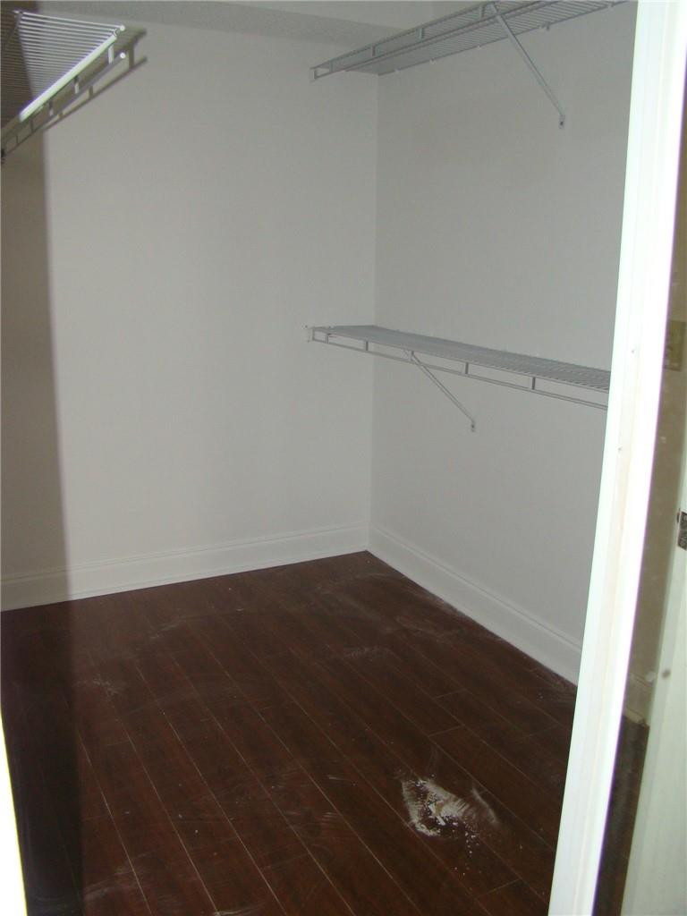 8871 Wiles Road, Unit 302 Coral Springs, FL 33067 - Photo 12 of 27 Master closet