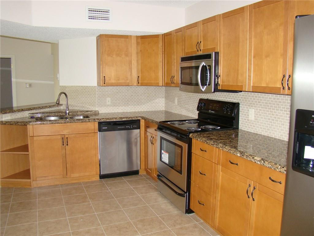 8871 Wiles Road, Unit 302 Coral Springs, FL 33067 - Photo 3 of 27 Photo 3