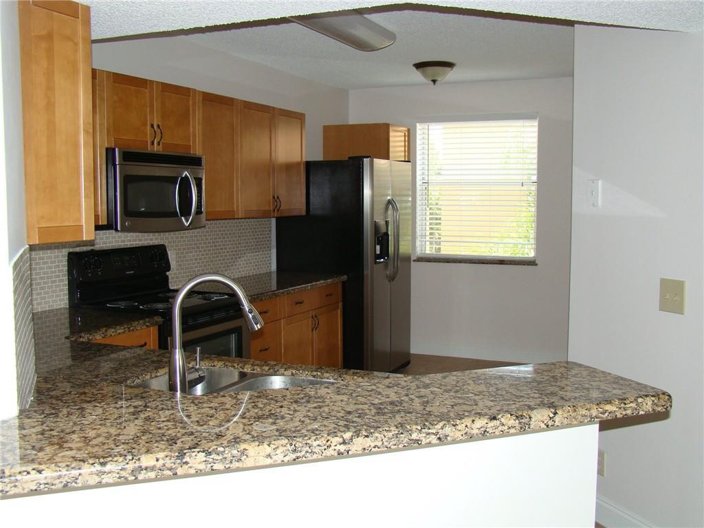 8871 Wiles Road, Unit 302 Coral Springs, FL 33067 - Photo 4 of 27 Photo 4