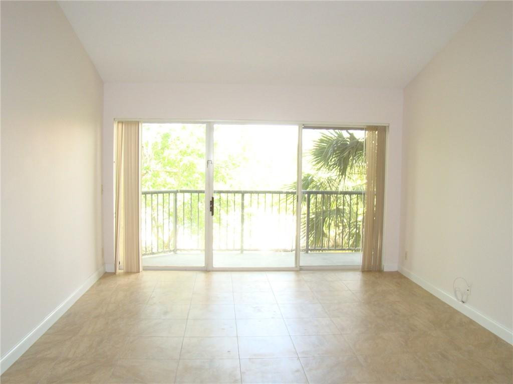 8871 Wiles Road, Unit 302 Coral Springs, FL 33067 - Photo 9 of 27 Outdoor balcony measures 13 x 4