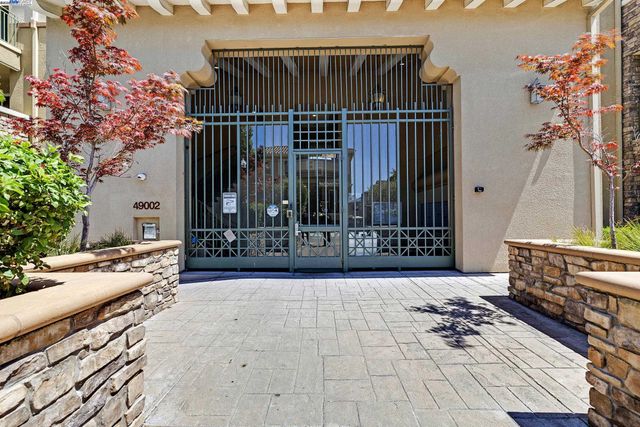 a view of a slide with a fountain