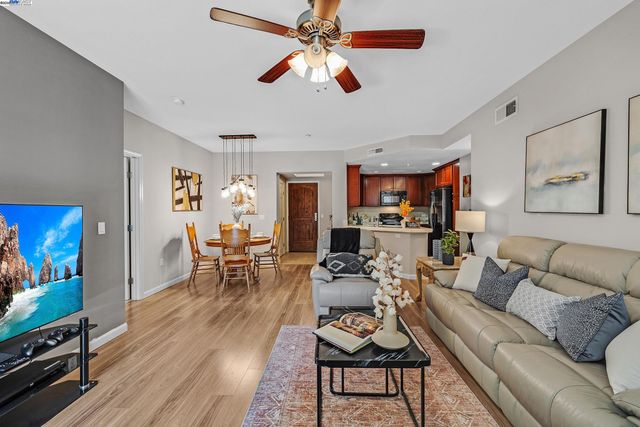 a balcony view with a sitting space