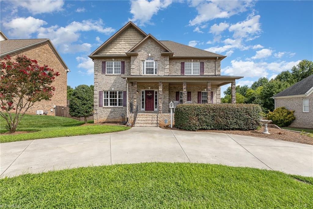 6657 Ridge Run Court Clemmons, NC 27012 - Photo 1 of 28 Beautiful Brick Home with over 3400 SF and Circle Drive!