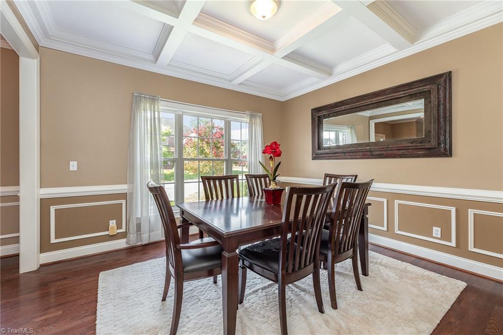 6657 Ridge Run Court Clemmons, NC 27012 - Photo 7 of 28 The dining room also offers coffered ceilings and a large window for excellent light.