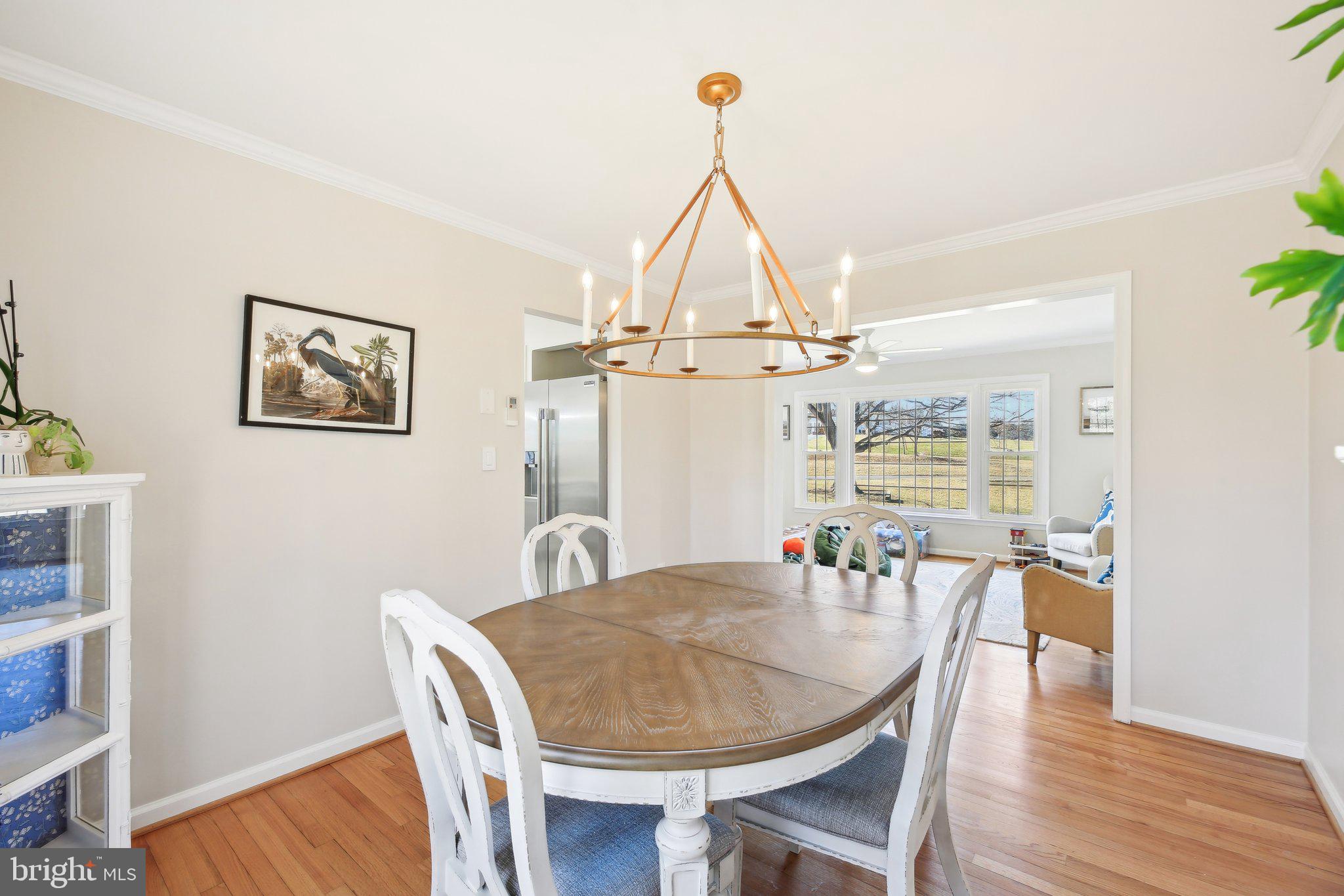 2139 Daisy Road Woodbine, MD 21797 - Photo 11 of 62 a view of a dining room with furniture window and wooden floor