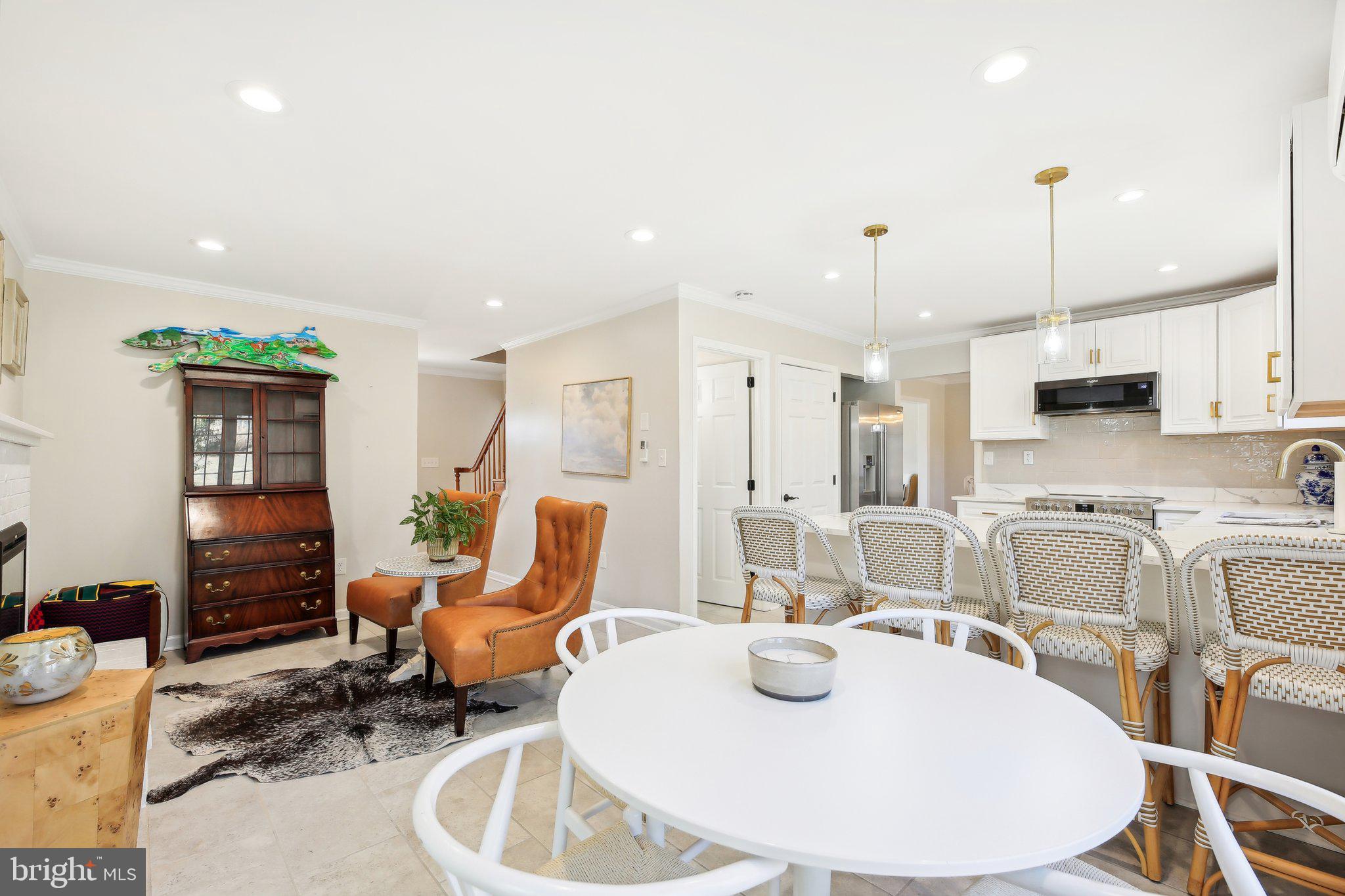 2139 Daisy Road Woodbine, MD 21797 - Photo 16 of 62 a living room with stainless steel appliances furniture a rug and a kitchen view