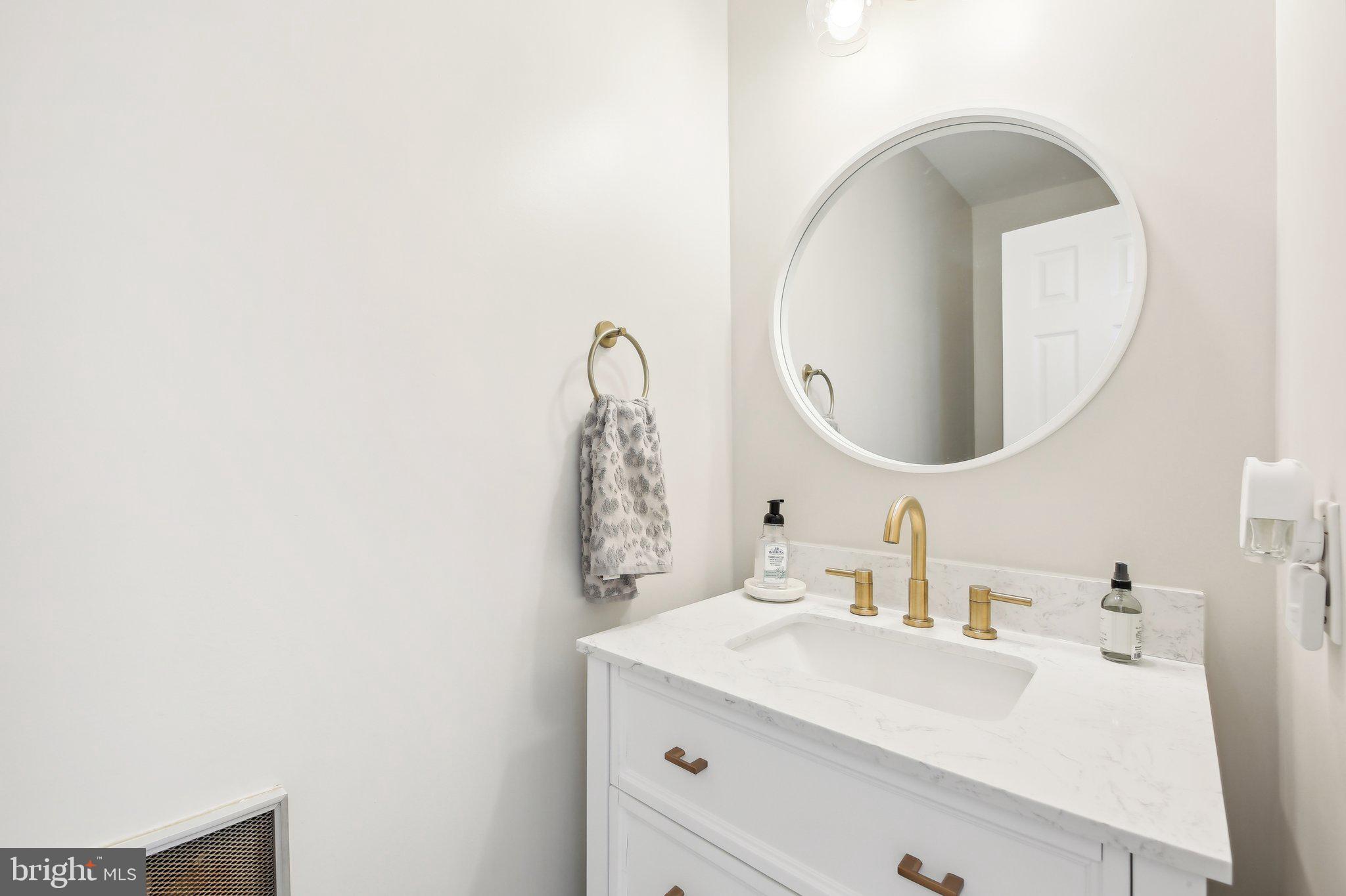 2139 Daisy Road Woodbine, MD 21797 - Photo 20 of 62 a bathroom with a sink and a mirror