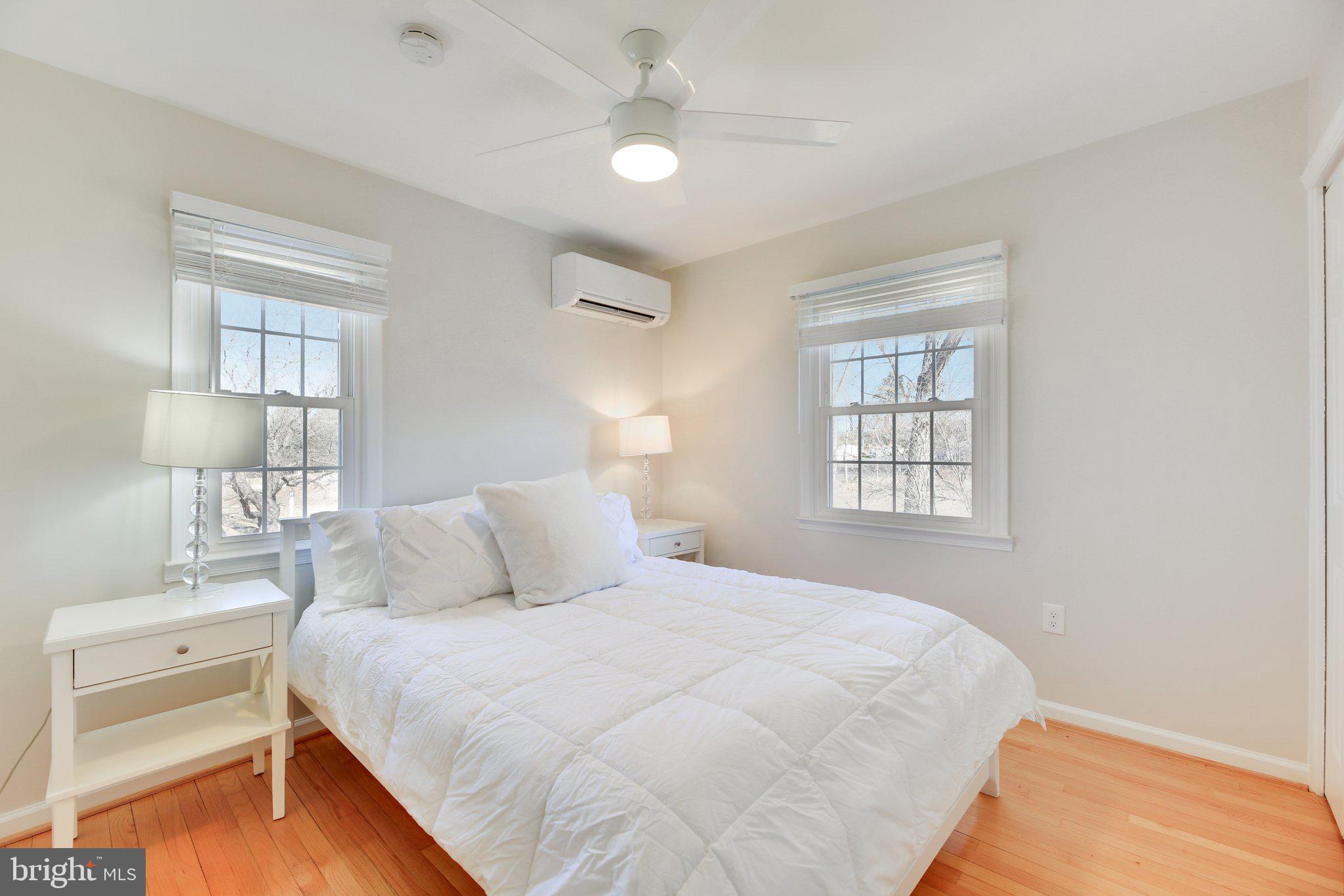 2139 Daisy Road Woodbine, MD 21797 - Photo 24 of 62 a bedroom with a bed and a night stand