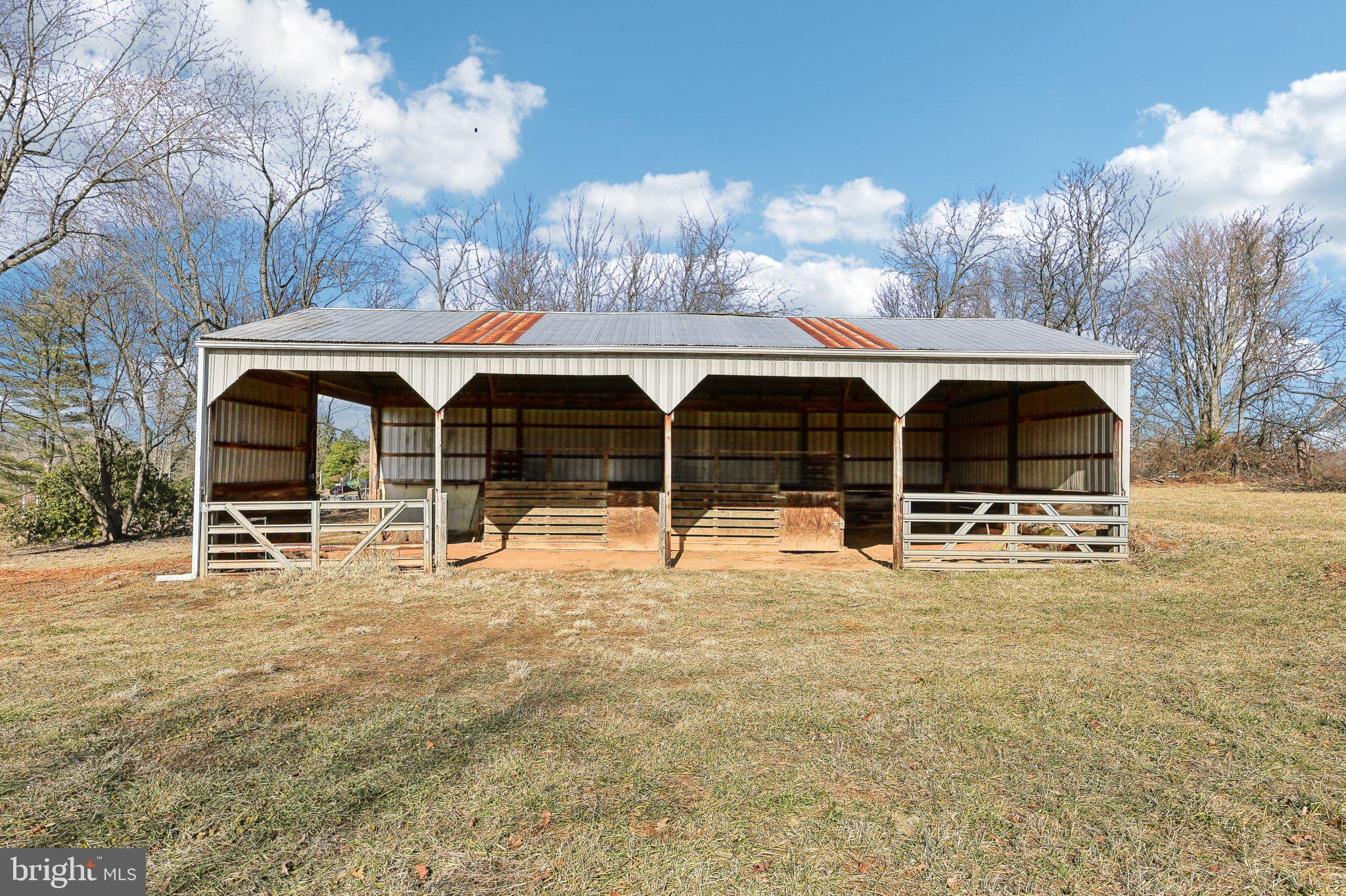 2139 Daisy Road Woodbine, MD 21797 - Photo 41 of 62 a view of a house with backyard and porch
