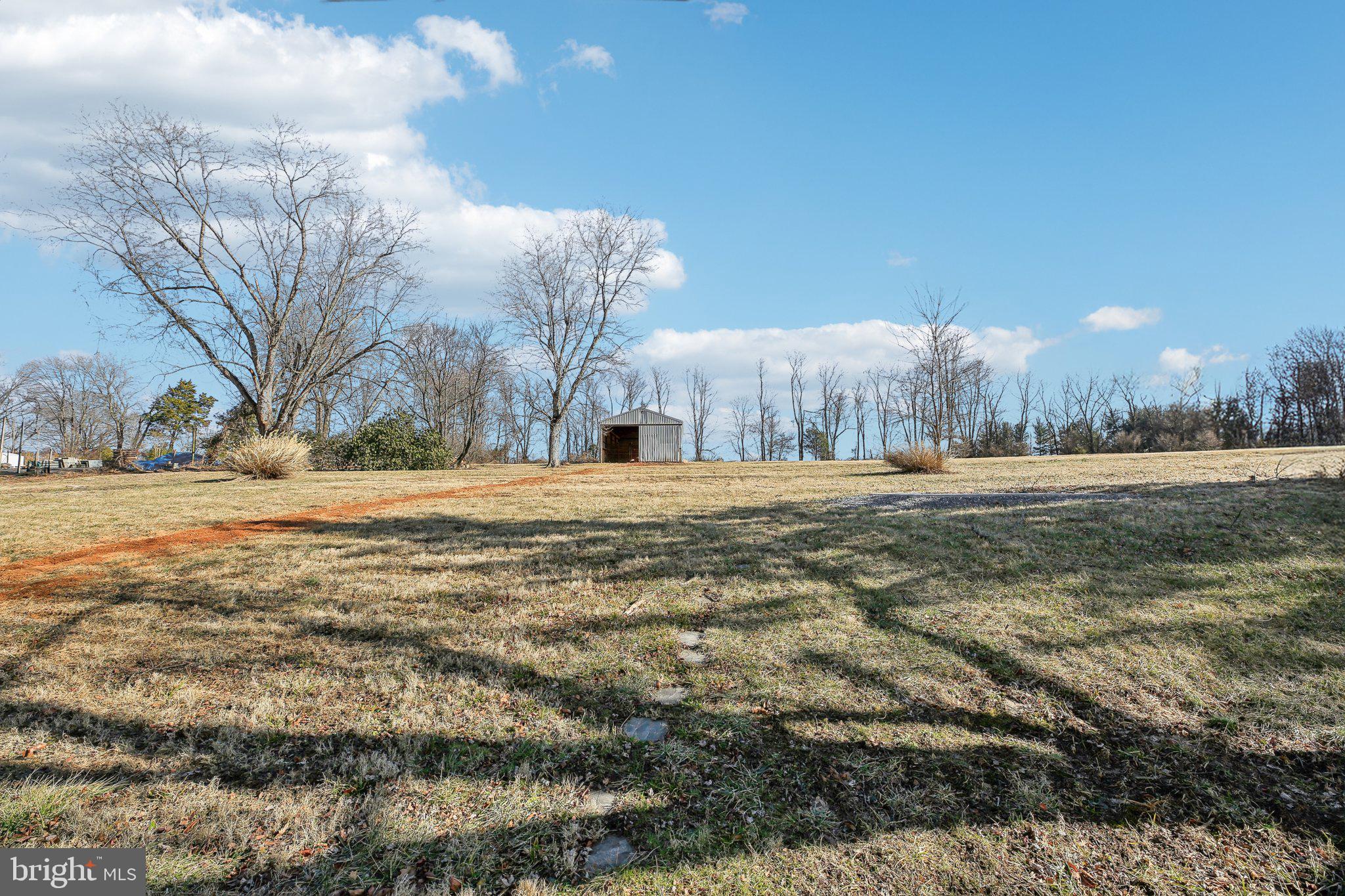 2139 Daisy Road Woodbine, MD 21797 - Photo 43 of 62 a view of dirt field with trees