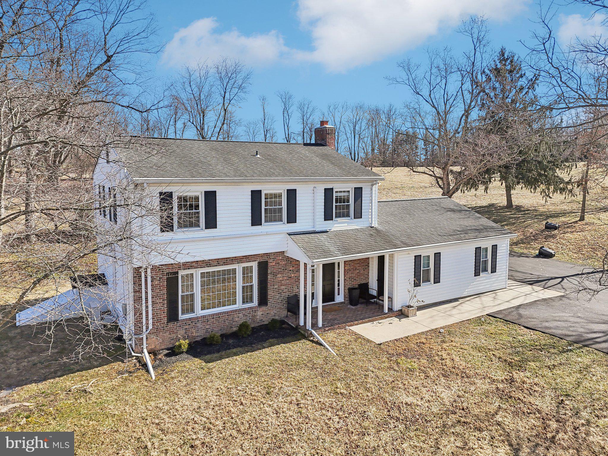 2139 Daisy Road Woodbine, MD 21797 - Photo 45 of 62 front view of a house with a yard