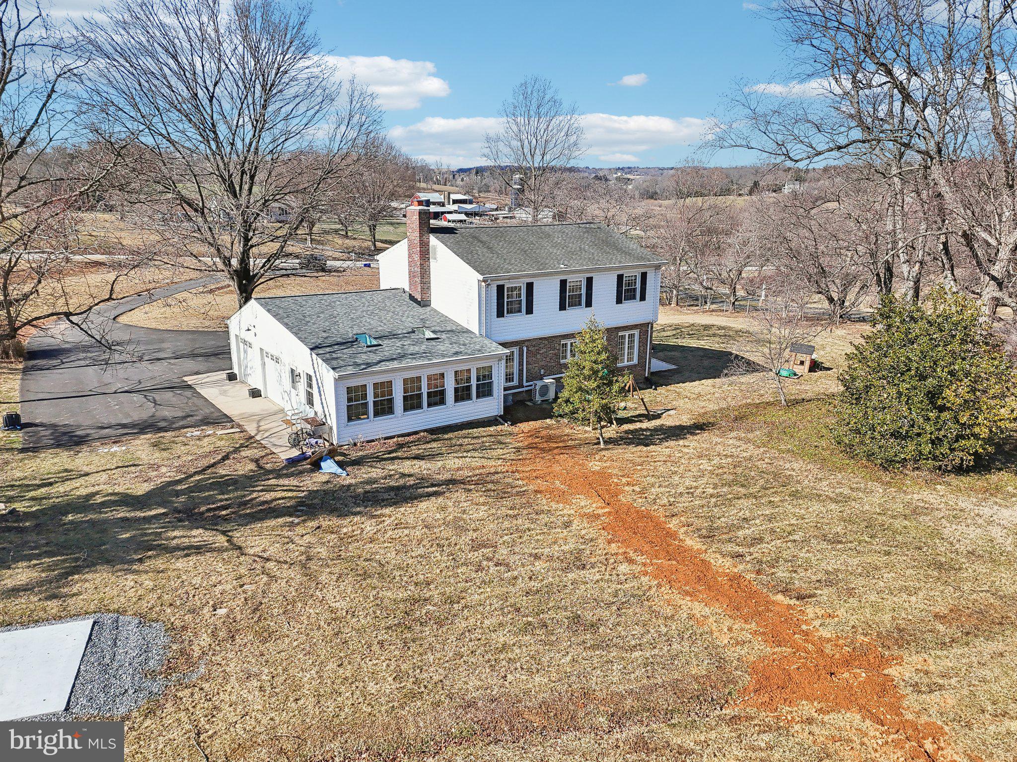 2139 Daisy Road Woodbine, MD 21797 - Photo 48 of 62 a aerial view of a house with large trees