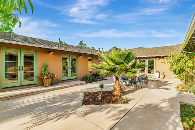 a garden view with a seating space