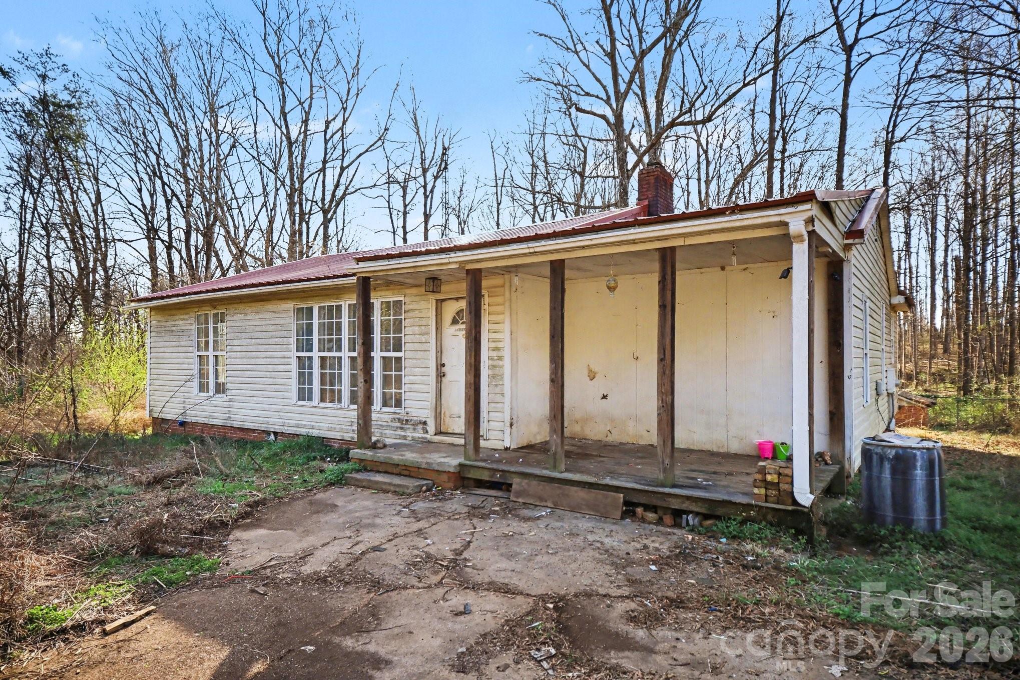453 Robert Road Cherryville, NC 28021 - Photo 2 of 36 a view of a house with backyard and garden